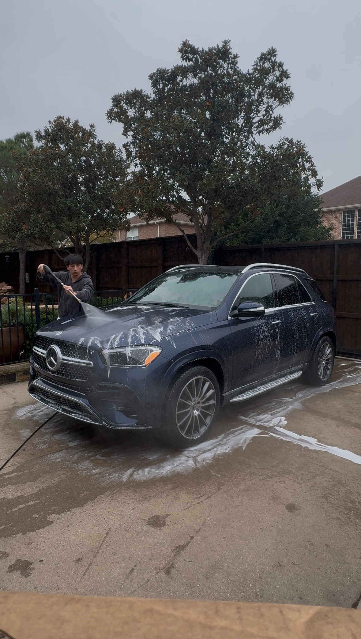 Carson Kim — owner of CK Mobile Detailing, performing a detail in Frisco TX